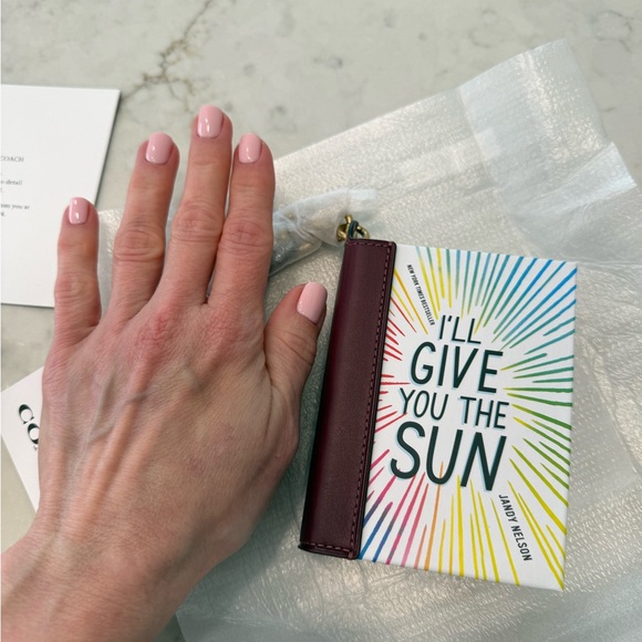 COACH I'll Give You The Sun By Jandy Nelson book charm 
NWT - Picture 8 of 8